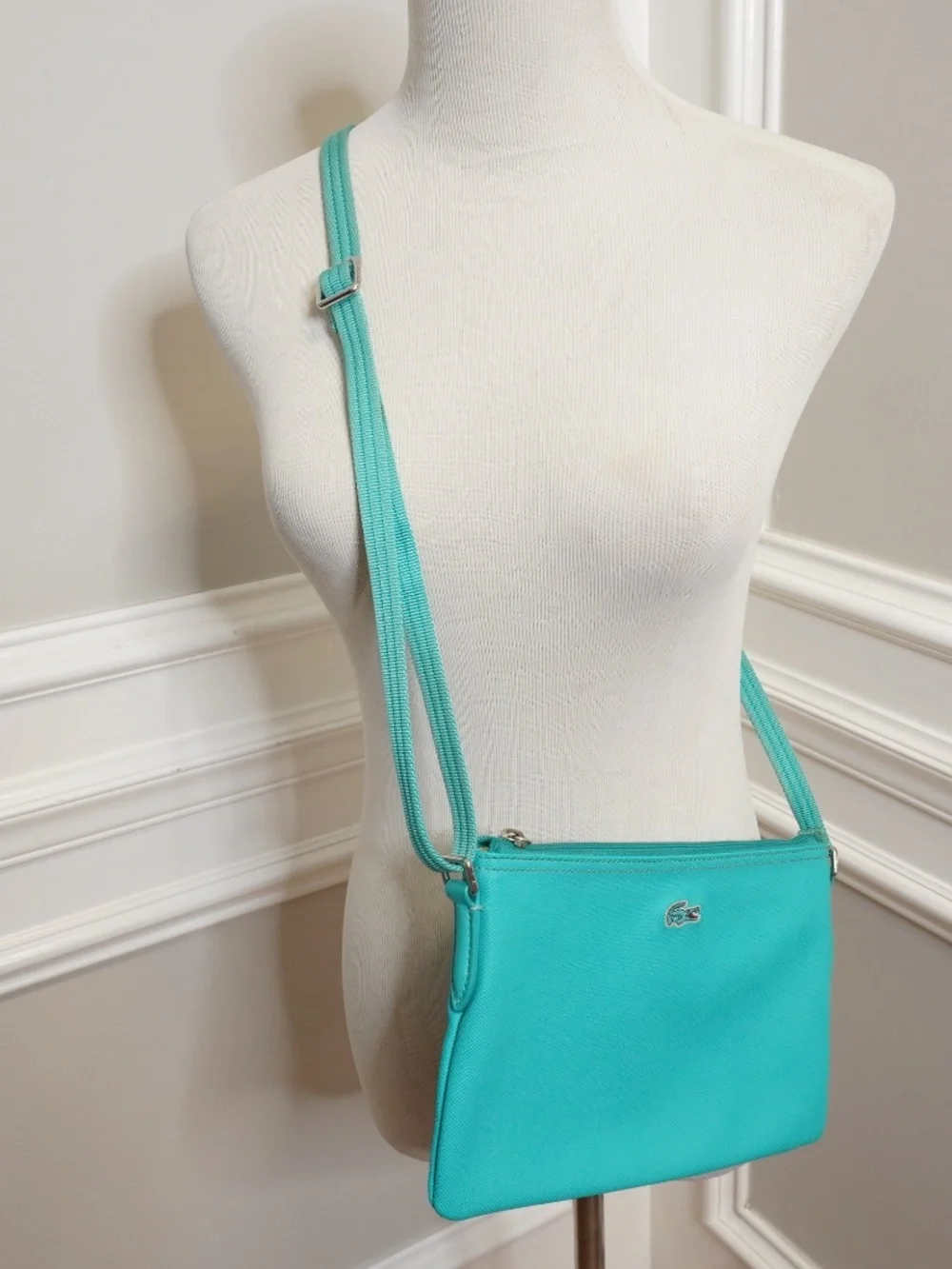 Lacoste Teal crossover bag PVC w/leather trimming